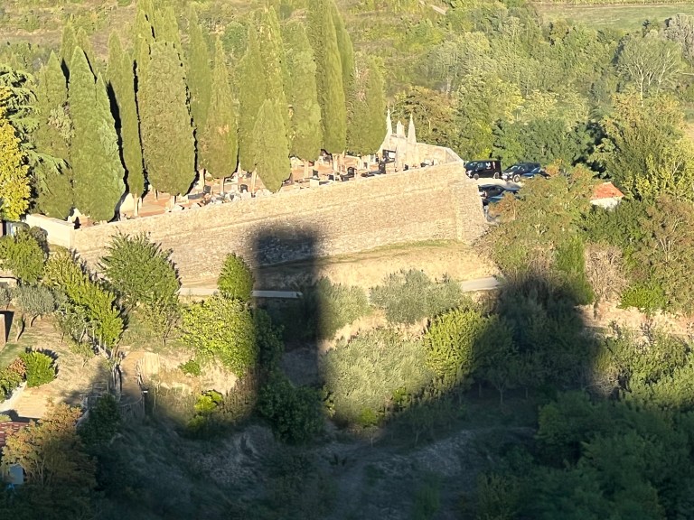 Aerial view of the cemetery and Church of St. Margaret at one end of the old town of Motovun, Croatia.
