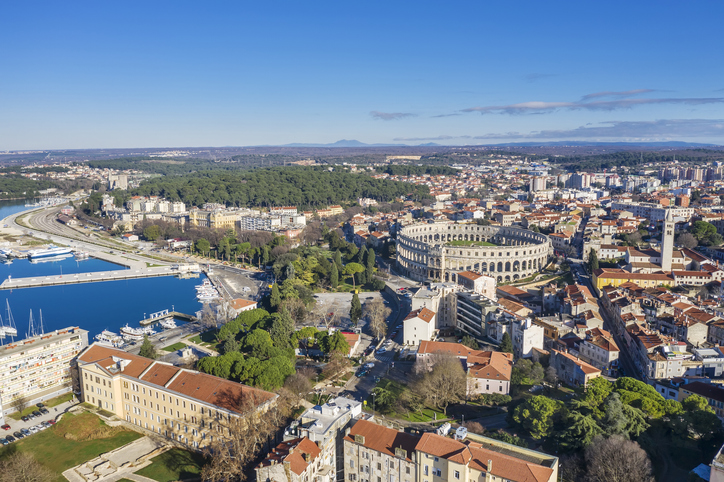 The Pula Arena is located just outside the Old Town near the port.